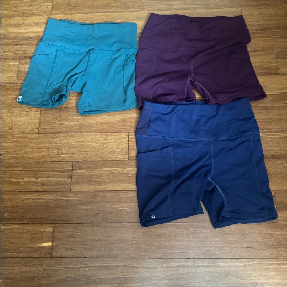 Set of Three oiselle Shorts in Teal, Purple, and Navy